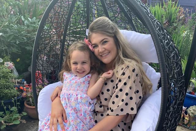 Charlotte with her daughter.