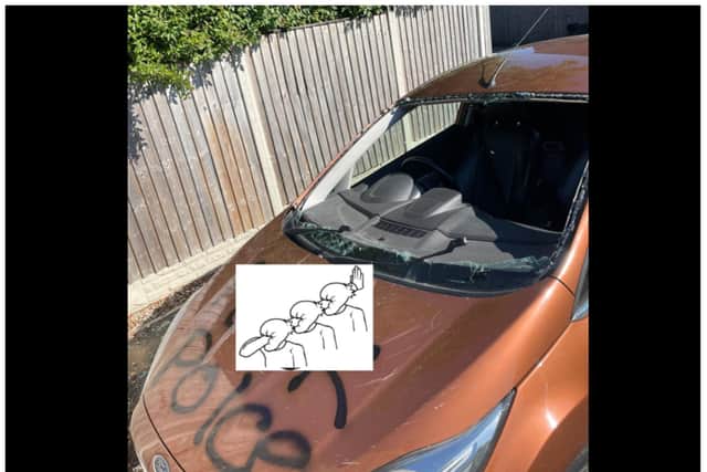 The car was sprayed with graffiti which read "f*** polce"