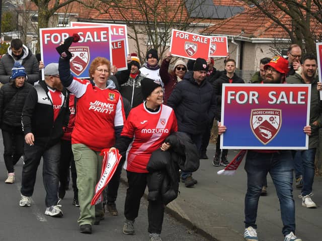 Morecambe fans holding a demonstration ahead of a recent home game.