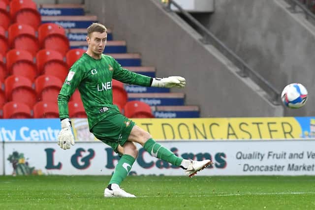 New Rovers keeper Joe Lumley plays out. Picture: Andrew Roe/AHPIX