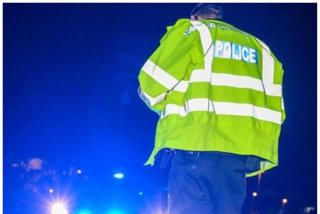 A man suffered a broken ankle in a collision with a police car in Doncaster.