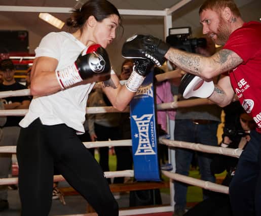 Terri Harper works the pads with trainer Stefy Bull. Picture: Mark Robinson