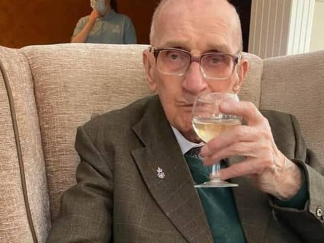 Cheers! Stan Vickers raises a glass