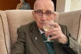 Cheers! Stan Vickers raises a glass