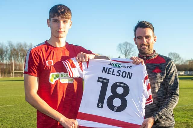 Ben Nelson with Doncaster Rovers head coach Danny Schofield. Photo: Heather King/DRFC.