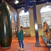 A bomb went off in poland - the big sister version of the bomb seen in kelham island museum with Gemma Holden looking at it.