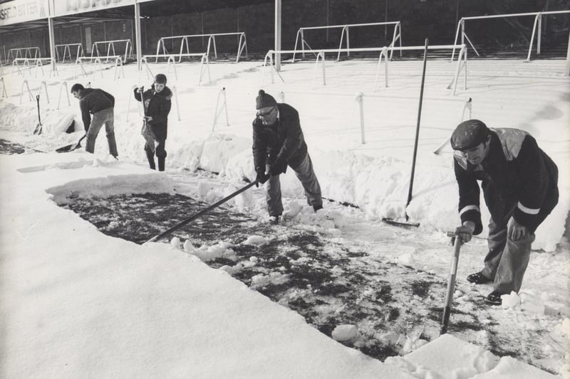 Clearing snow at Saltergate, Chesterfield.
22 December 1981
Staff and supporters of Chesterfield FC started the task of clearing the snow at their Saltergate pitch in the hope of a start to the local Boxing Day derby match of Chesterfield vs Doncaster.