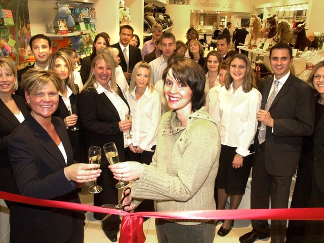 Meadowhall Mama's and Papa's store manager Karen Smith (left) and Midwife of the Years Angela Hewett(right) pictured at the store opening in 2003. Also pictured are staff and colleagues