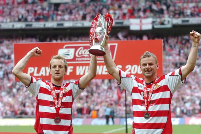 James Coppinger and Richie Wellens celebrate victory in the play-off final in 2008