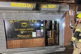 Megabites Cafe was hit by a devastating blaze last summer.