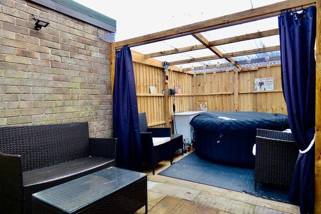 Offers over £255,000 are being invited for this four-bedroom detached house in High Green - it has its own bar and a hot tub area. (https://www.zoopla.co.uk/for-sale/details/56873423)