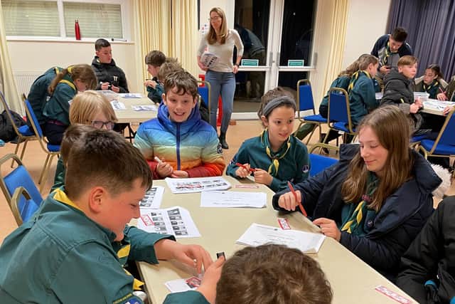 Scouts learning BSL and deaf awareness