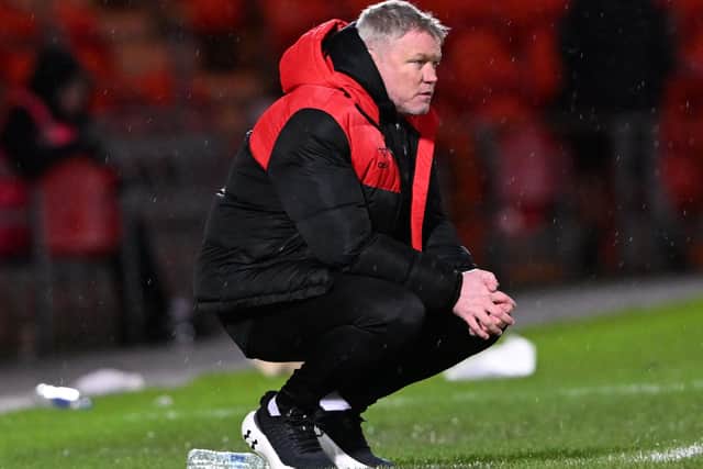 Grant McCann watches on frustratingly during Rovers' draw with Cheltenham.