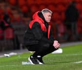 Grant McCann watches on frustratingly during Rovers' draw with Cheltenham.
