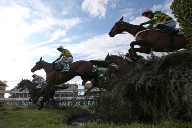 Action from the 2021 Randox Grand National. Photo: Tim Goode - Pool/Getty Images
