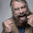 Acting legend Brian Blessed punched a polar bear on the nose to save its life.