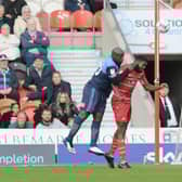 Wycombe's Ade Akinfenwa heads home Wycombe's second. Photo: Howard Roe/AHPIX LTD