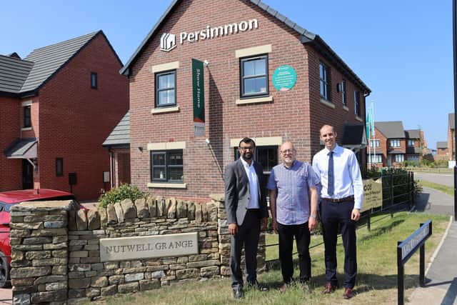 Deputy Mayor Glyn Jones, Councillor Majid Khan and Persimmon Land Manager Liam Hessay