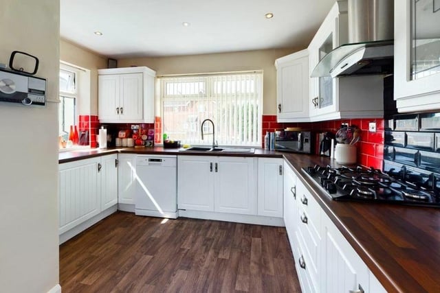 An attractive kitchen with shaker-style units.
