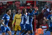 Chey Dunkley celebrates the opener against Rovers.