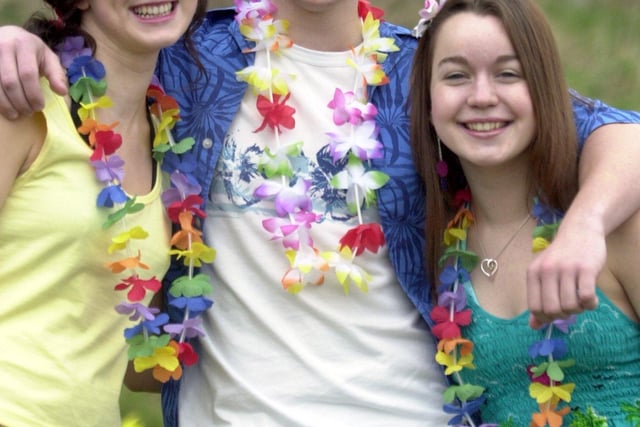 Sixth formers dressed as Hawaiians and pirates during their charity week at Tapton Schoo in 2004. l/r: Helena Betts(17), Paul Mitchell(19) and Charlotte Musgrove(16).               1 April 2004