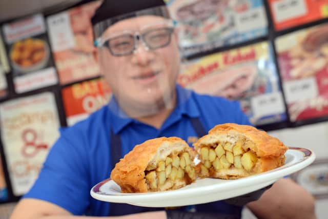 Paul Sung, pictured with his Battered Chip Butty.