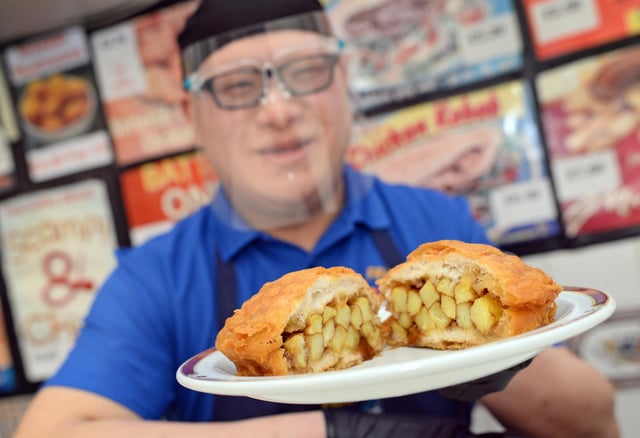 Paul Sung, pictured with his Battered Chip Butty.