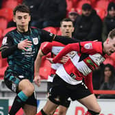 Crewe's Ed Turns (left) is a doubt for the play-off meeting with Rovers.