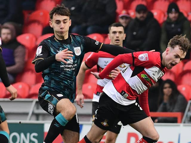 Crewe's Ed Turns (left) is a doubt for the play-off meeting with Rovers.
