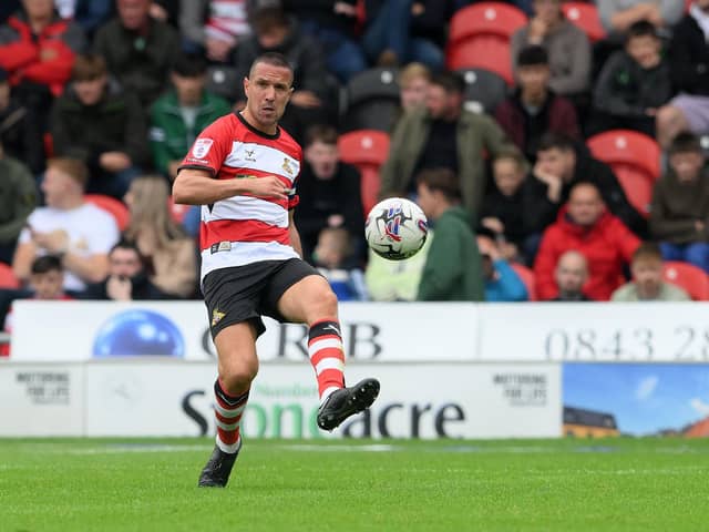 Doncaster Rovers' Richard Wood made a return from injury in a behind-closed-doors friendly win at Harrogate.