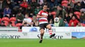 Doncaster Rovers' Richard Wood made a return from injury in a behind-closed-doors friendly win at Harrogate.