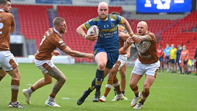 Dons’ Liam Johnson breaks through to score a try in the win over Hunslet. Photo: Andrew Roe/AHPIX LTD