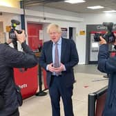 Prime Minister Boris Johnson stops for a few photographs