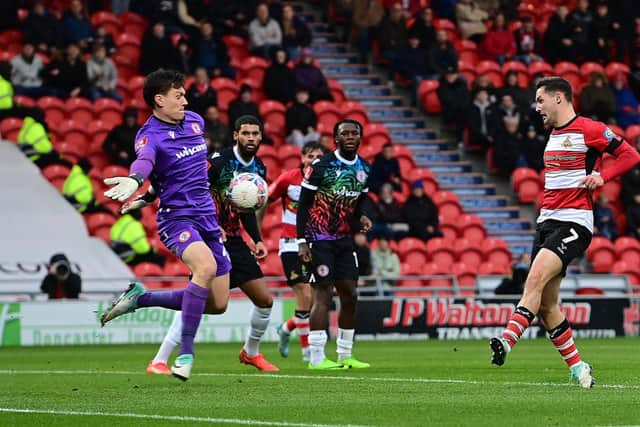 Luke Molyneux is denied by Accrington keeper Jon McCracken.