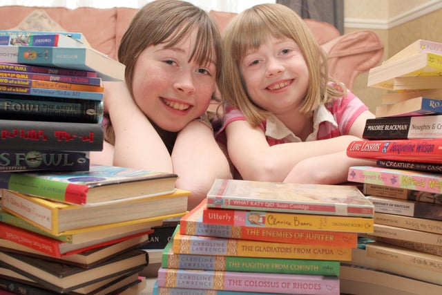 Rosie, 12, and Emily 9, Dods, sisters who get lost in books at Chesterfield Library's reading club in 2008