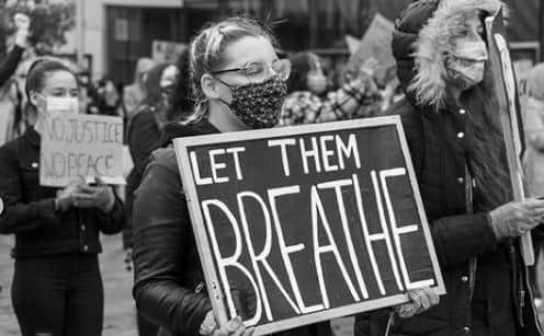 The sign reads: Let them breathe.