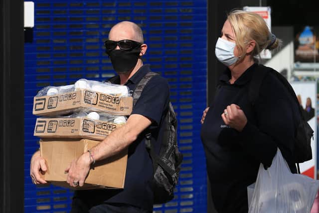 There are concerns that people impersonating council workers are handing out fines for not wearing masks in Doncaster (Photo by LINDSEY PARNABY/AFP via Getty Images)