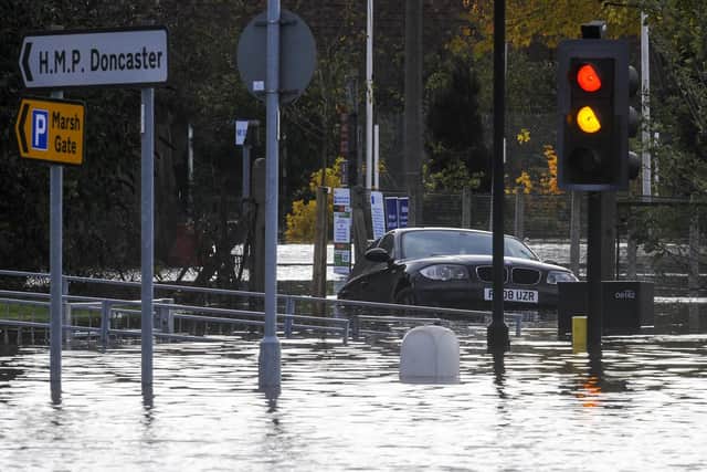 Stranded car in flood water at Doncaster