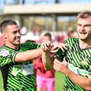 George Miller and Tommy Rowe celebrate another win.