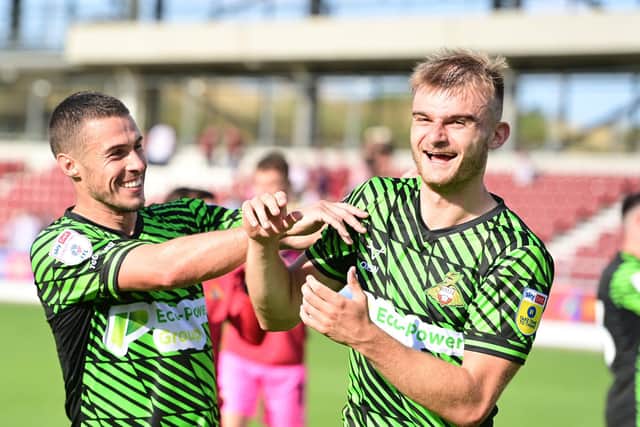 George Miller and Tommy Rowe celebrate another win.