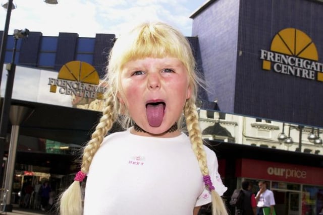 Six year old Zoe Rawling from Denaby outside the Frenchgate centre in August of 2000.