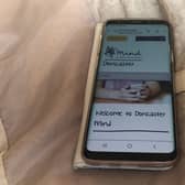 Doncaster Mind's website on mobile phone.