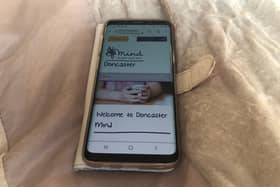 Doncaster Mind's website on mobile phone.