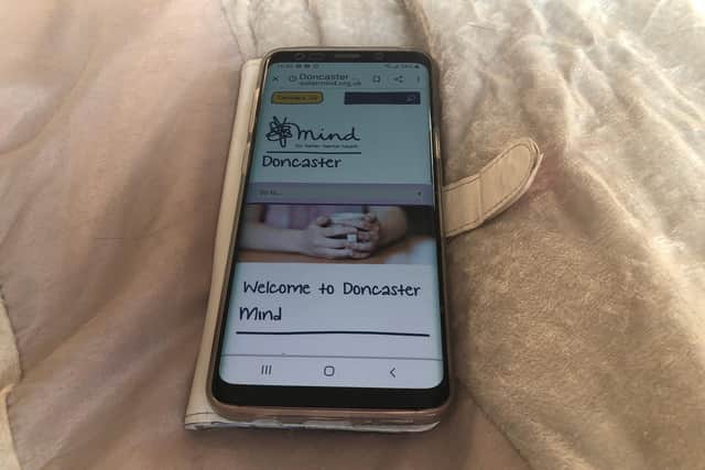 Doncaster Mind's website on mobile phone.