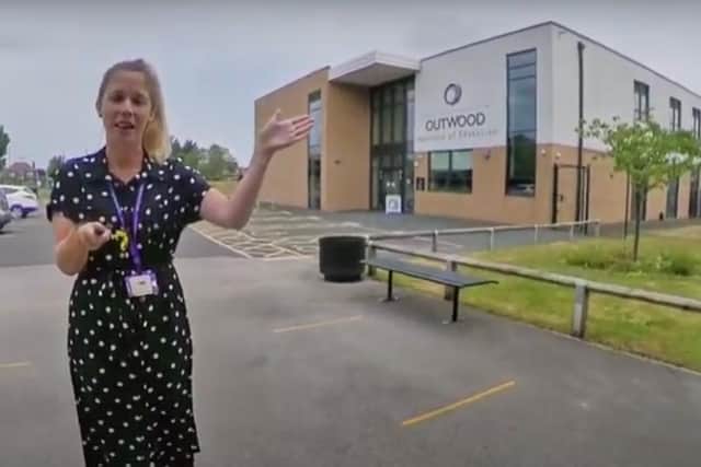 Outwood Academy Adwick assistant principal Hannah Smith shows the yellow lines to help keep pupils 2m apart