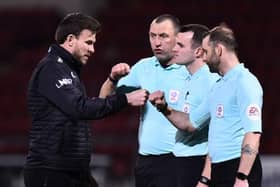 Andy Butler speaks to the officials after the defeat to Crewe. Photo: Nathan Stirk/Getty Images