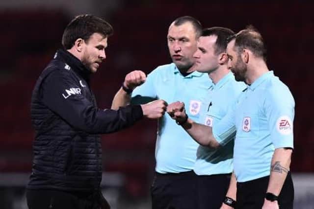 Andy Butler speaks to the officials after the defeat to Crewe. Photo: Nathan Stirk/Getty Images