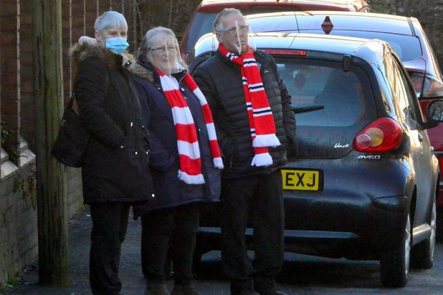 Mourners wore Sunderland AFC scarves for the funeral in tribute to Eddie.