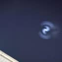 The spiral, believed to be from a SpaceX rocket launch, was spotted in the skies above Doncaster. Photo: Amy Bird/Video: Al West).