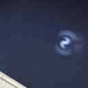 The spiral, believed to be from a SpaceX rocket launch, was spotted in the skies above Doncaster. Photo: Amy Bird/Video: Al West).